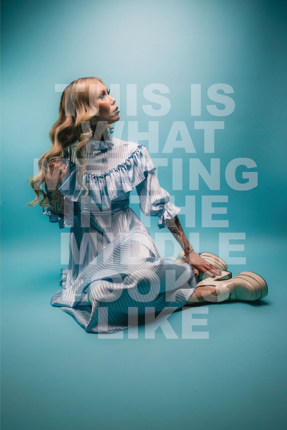 Model in a blue striped ruffled dress on teal, with overlaid words about meeting in the middle, Pastel Goths, Edmonton